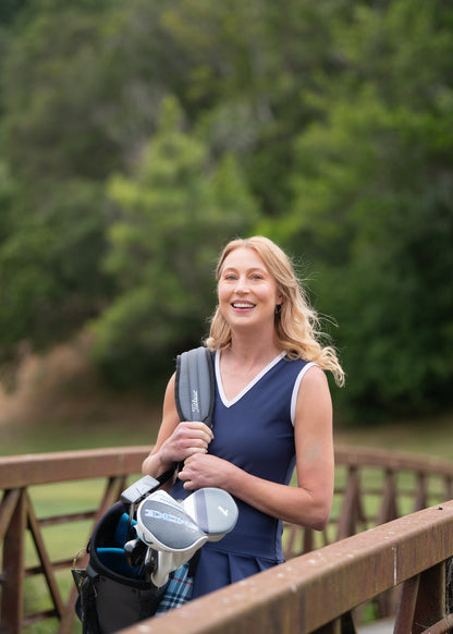 AGGIE BLUE PLAID DRESS – CHIC & VERSATILE WOMEN’S ATHLETIC DRESS FOR ON & OFF THE COURT AND COURSE