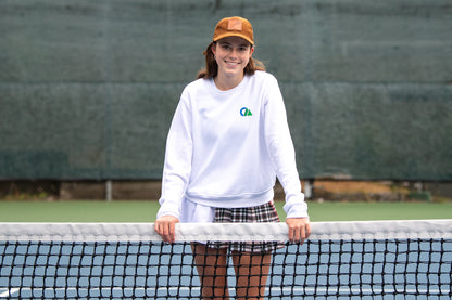 THE AGGIE BROWN PLAID SKORT— POLISHED PLAID FOR PLAY, PRACTICE, AND POST-MATCH PLANS.