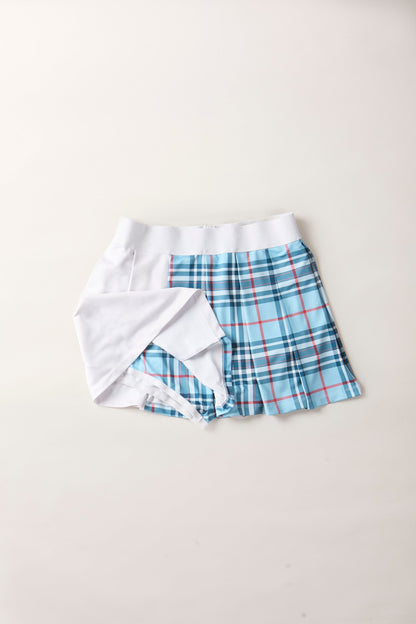 THE AGGIE BLUE PLAID SKORT— POLISHED PLAID FOR PLAY, PRACTICE, AND POST-MATCH PLANS